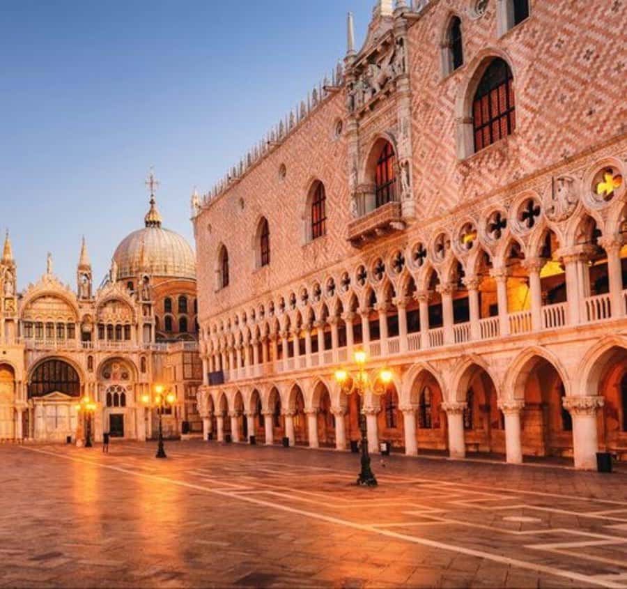 Guided tour group exploring Doge’s Palace Grand Council Chamber