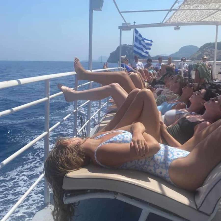 Rhodes: Bay to Bay Swim Cruise with Greek Buffet and Wine