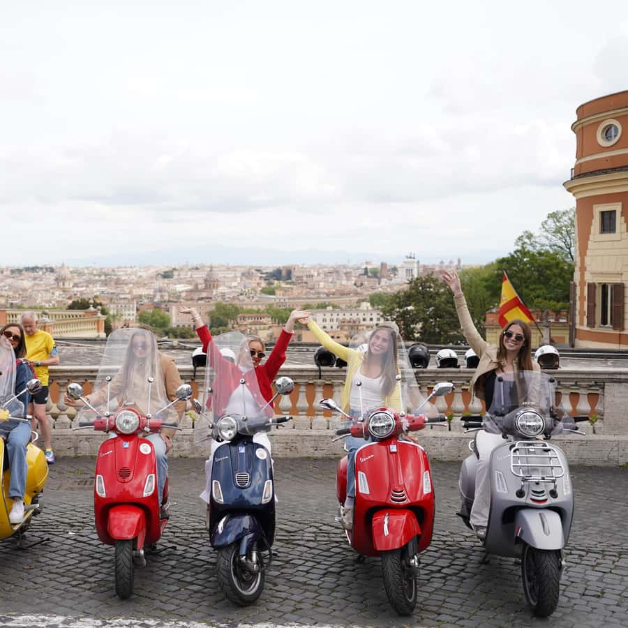 Rome: Photography service by Vespa Scooter GetYourGuide