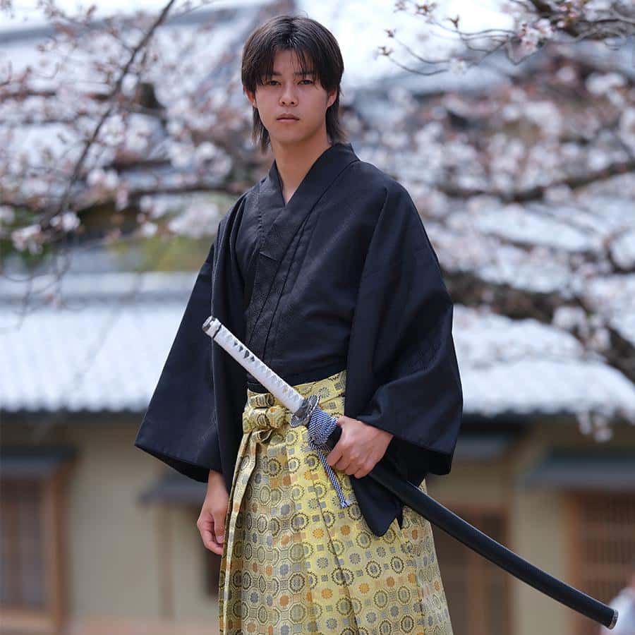 Traditional samurai warrior kimono ceremonial attire display showcasing intricate fabric patterns and family crests