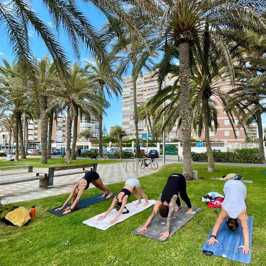 Yoga on the beach San Juan, Alicante GetYourGuide