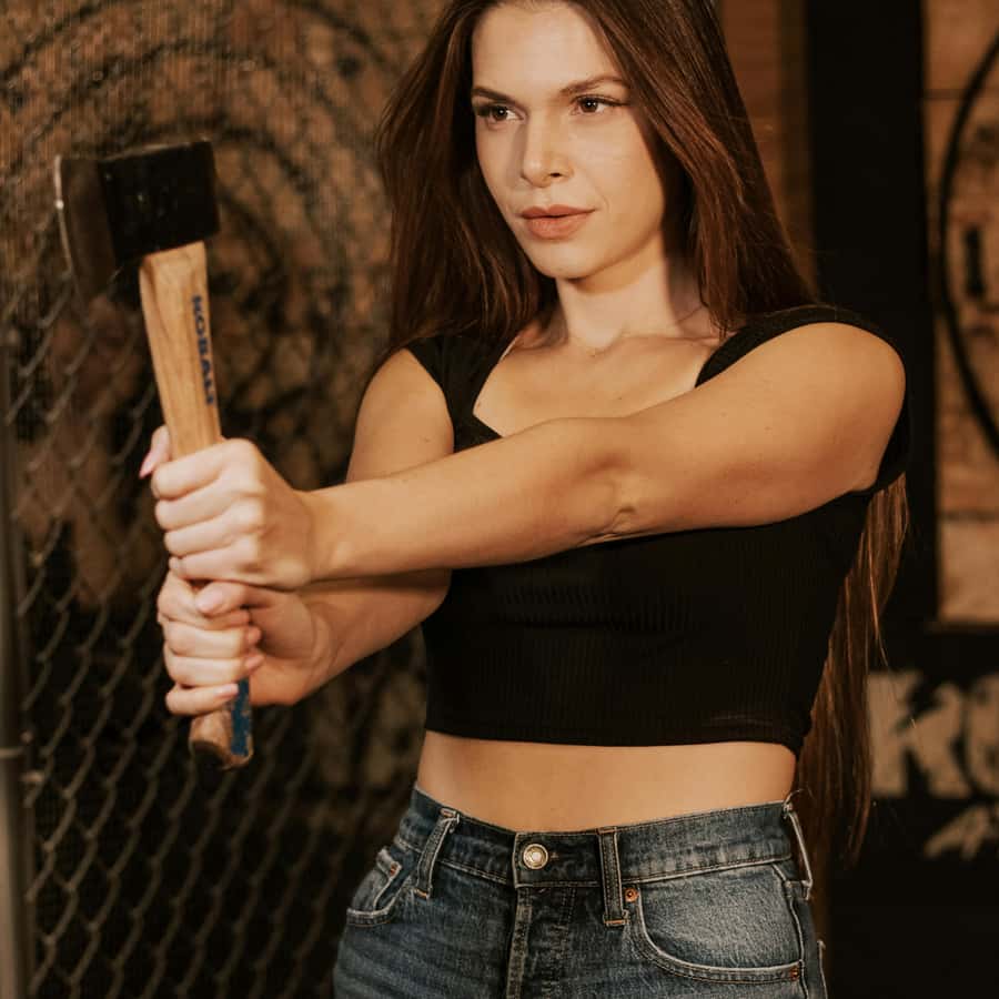 cowgirl photoshoot idea axe throwing