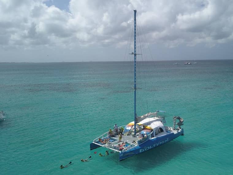 Catamaran under sail off Aruba's north-west coast, on the run out to the Antilla