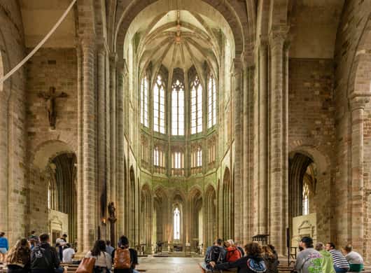 Mont Saint-Michel bij zonsondergang