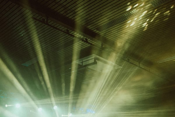 Group of friends entering a famous Berlin techno club with vibrant neon lights and an atmospheric crowd Group of friends entering a famous Berlin techno club with vibrant neon lights and an atmospheric crowd