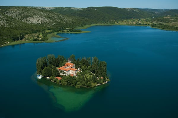 Aerial view of the historic island city of Trogir, Croatia, a UNESCO World Heritage site with stone architecture and blue Adriatic sea Aerial view of the historic island city of Trogir, Croatia, a UNESCO World Heritage site with stone architecture and blue Adriatic sea