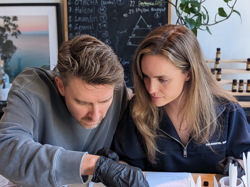Participants creating bespoke perfumes at a mindful workshop in a light-filled Amsterdam canal house studio. Participants creating bespoke perfumes at a mindful workshop in a light-filled Amsterdam canal house studio.