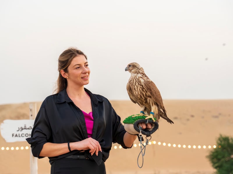 Classic open-top Mercedes G-Class driving on golden dunes at sunrise in Al Marmoom Desert, Dubai Classic open-top Mercedes G-Class driving on golden dunes at sunrise in Al Marmoom Desert, Dubai