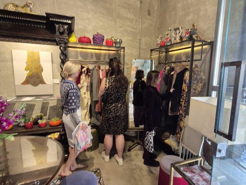 Personal stylist guiding a client on a luxury shopping tour near the Spanish Steps in Rome, with elegant boutiques in the background. Personal stylist guiding a client on a luxury shopping tour near the Spanish Steps in Rome, with elegant boutiques in the background.