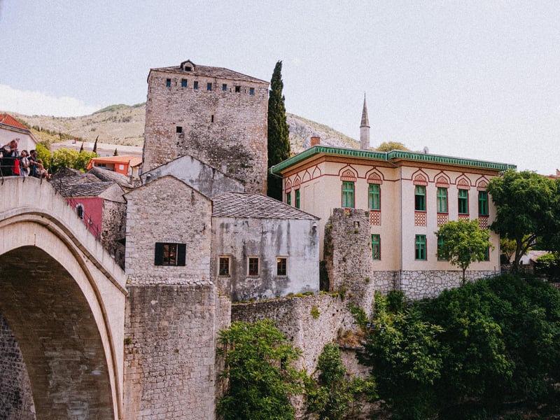 Panoramic view of Budva's medieval old town, Adriatic coast, and Montenegrin mountains on a multi-day tour. Panoramic view of Budva's medieval old town, Adriatic coast, and Montenegrin mountains on a multi-day tour.