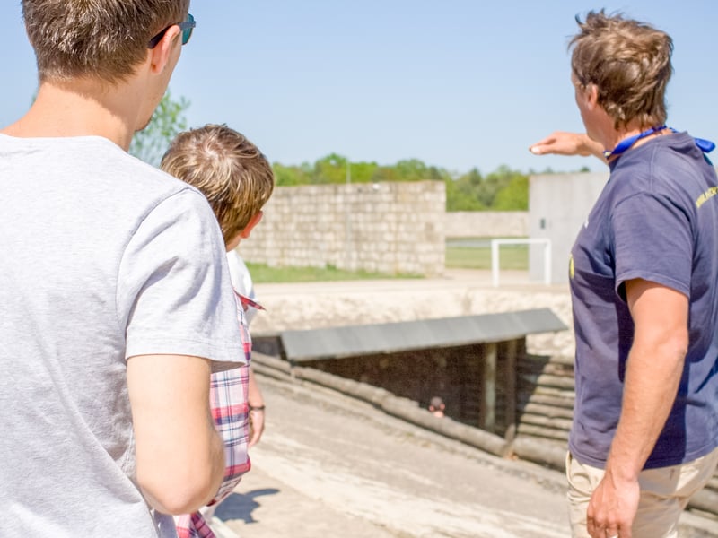 Guided tour group walking through the historic Sachsenhausen Concentration Camp Memorial site near Berlin Guided tour group walking through the historic Sachsenhausen Concentration Camp Memorial site near Berlin