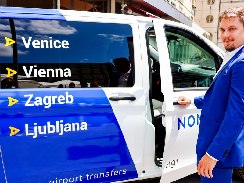 Traveler being greeted by a professional driver for a private transfer at Ljubljana Jože Pučnik Airport Traveler being greeted by a professional driver for a private transfer at Ljubljana Jože Pučnik Airport
