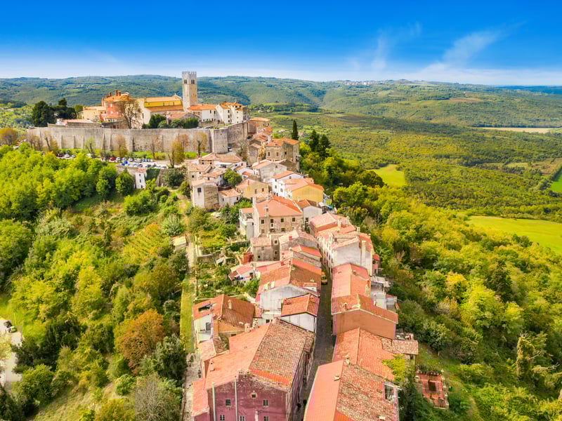 The majestic Pula Arena Roman amphitheater at sunset, showcasing ancient stone arches and towers. The majestic Pula Arena Roman amphitheater at sunset, showcasing ancient stone arches and towers.