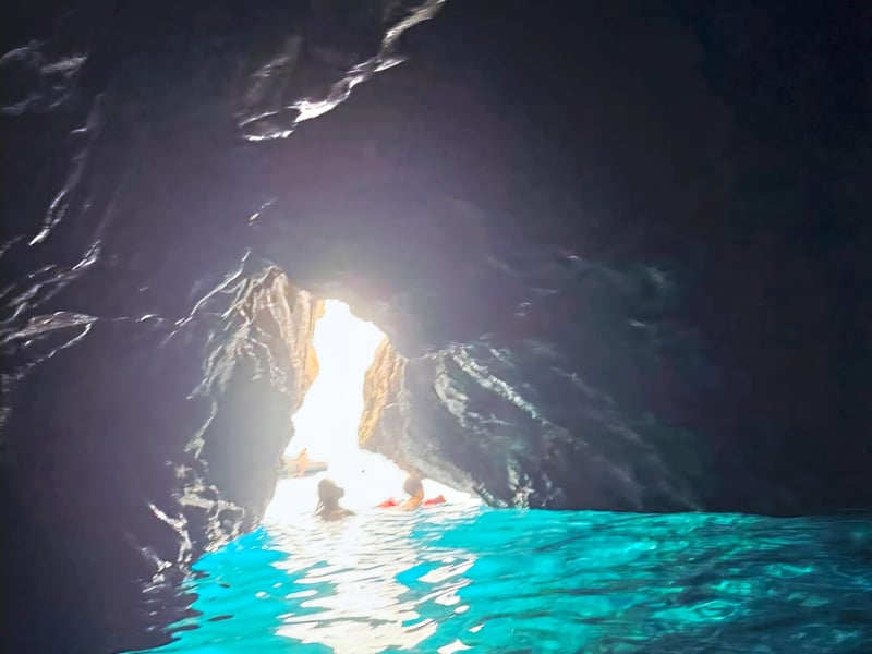 Aerial view of a private sailing yacht on the turquoise sea of Makarska Riviera with Biokovo Mountain in the background Aerial view of a private sailing yacht on the turquoise sea of Makarska Riviera with Biokovo Mountain in the background