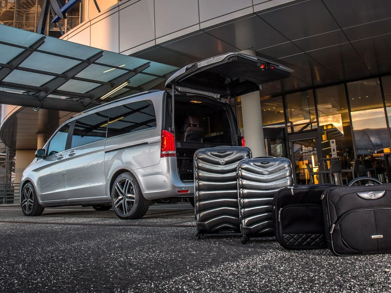 Private Mercedes transfer service at Split Airport Croatia with driver greeting a family Private Mercedes transfer service at Split Airport Croatia with driver greeting a family