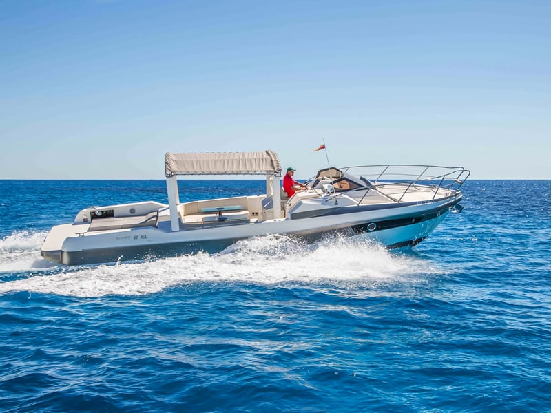 Vibrant boat party in the Blue Lagoon near Split Croatia with guests dancing and swimming in turquoise water Vibrant boat party in the Blue Lagoon near Split Croatia with guests dancing and swimming in turquoise water