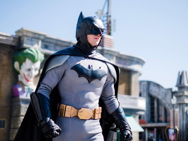 Vibrant main entrance and Hollywood Boulevard at Parque Warner Madrid theme park with families visiting. Vibrant main entrance and Hollywood Boulevard at Parque Warner Madrid theme park with families visiting.