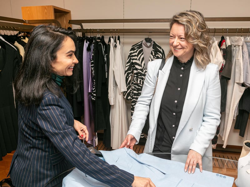 Exclusive luxury shopping tour in Venice with a personal stylist inside a high-end boutique overlooking a scenic canal. Exclusive luxury shopping tour in Venice with a personal stylist inside a high-end boutique overlooking a scenic canal.