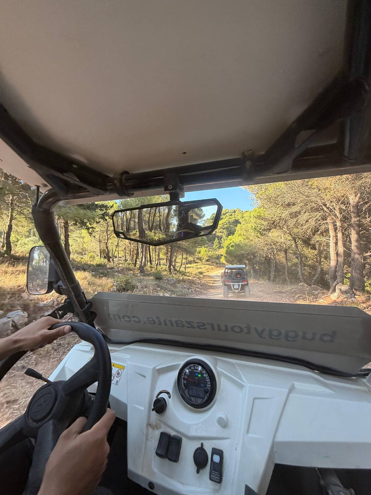 Behind the wheel of a Polaris RZR
