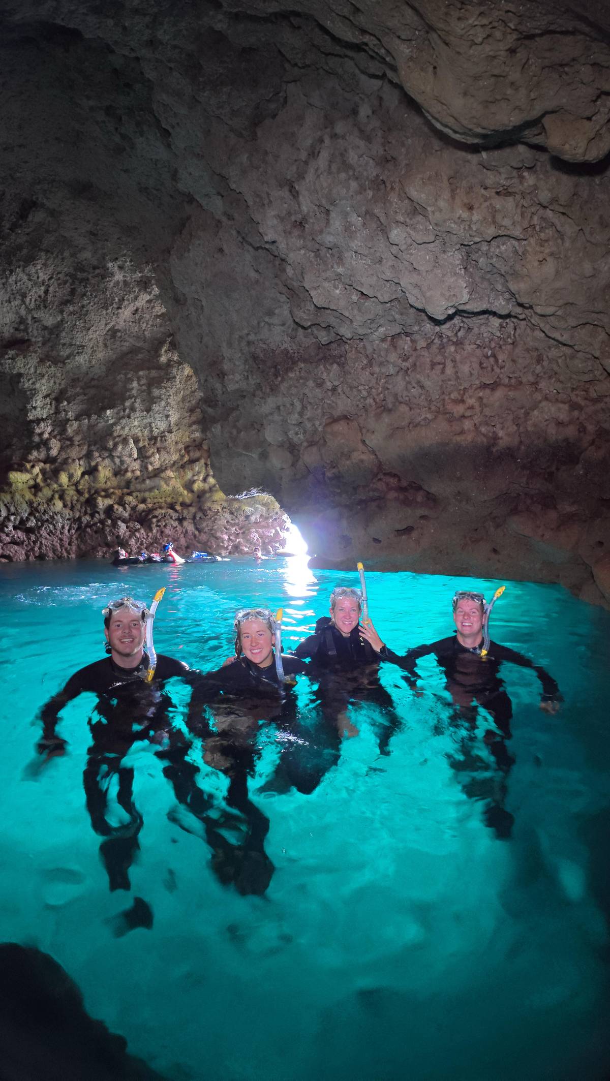 A group under the cave roof