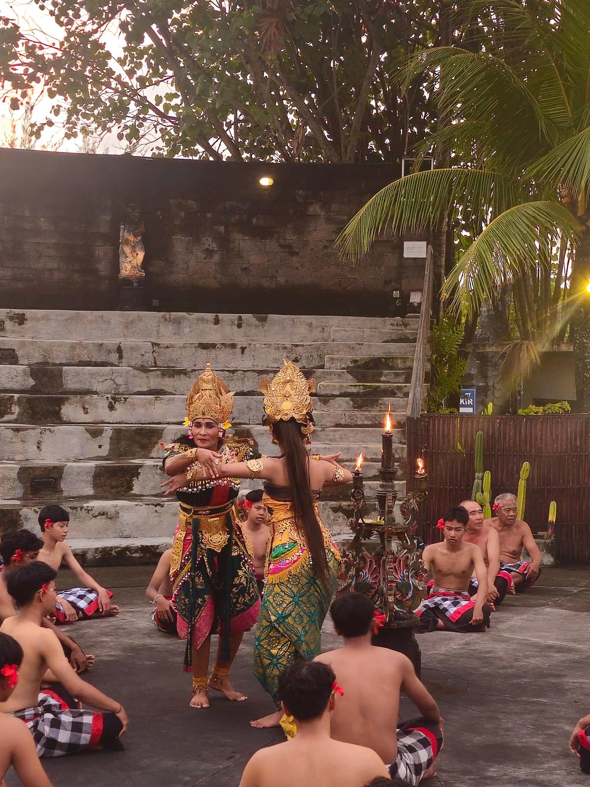 Kecak dancers in costume on the stage at Tanah Lot