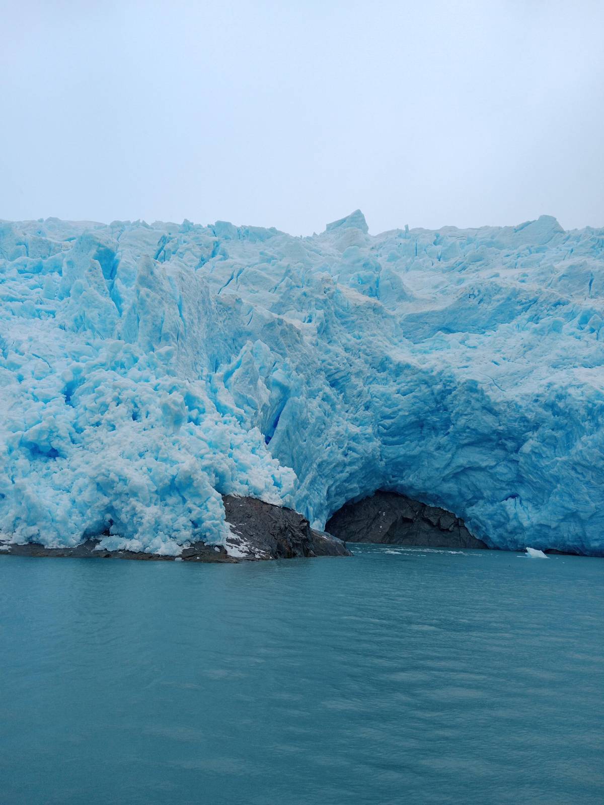 Ice caves at the foot of a glacier