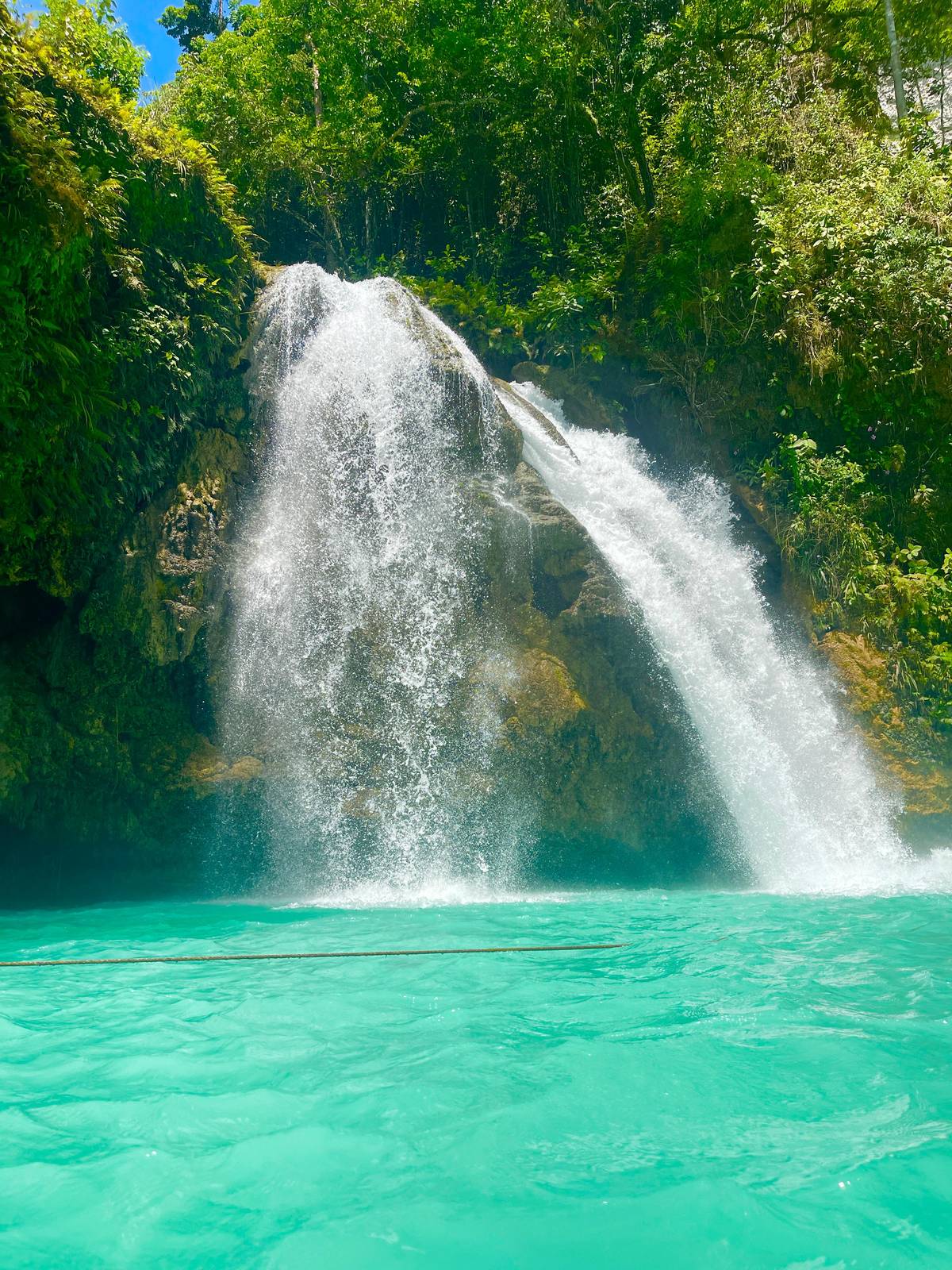 The turquoise pool below Kawasan Falls
