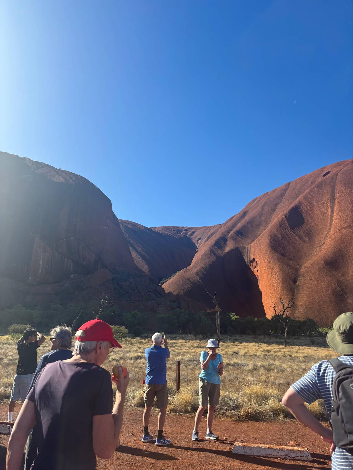 Guests at the sunset viewing area as the light turns