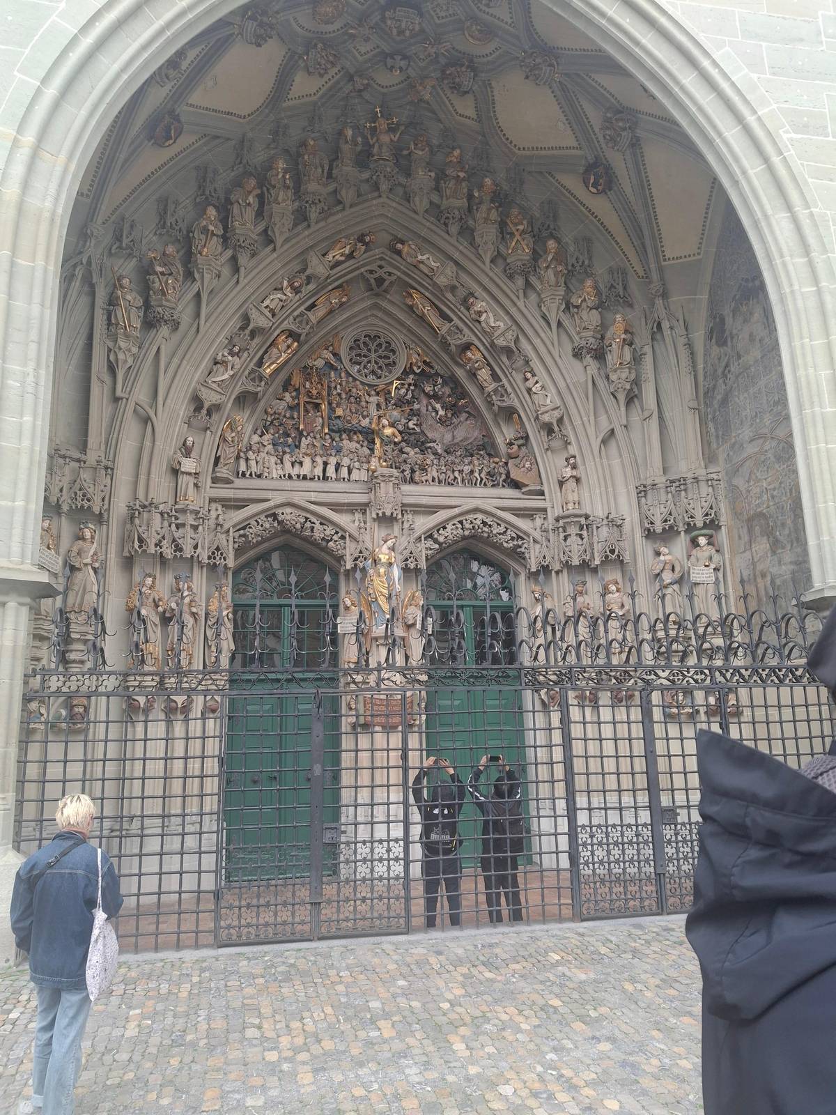 The Minster's main portal behind its iron gate