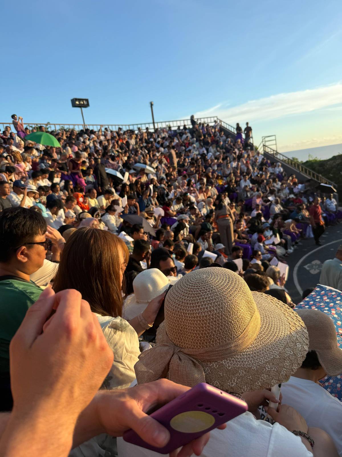 Packed stone benches before the show starts