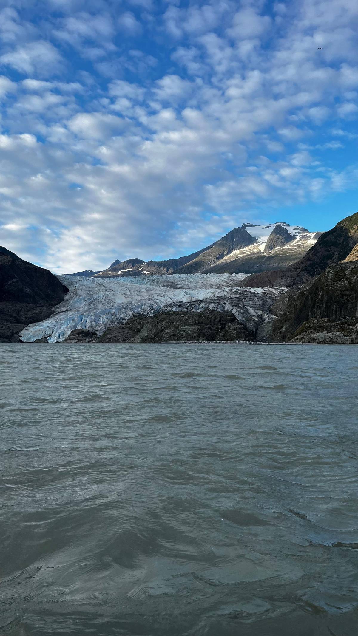 The glacier face across the water