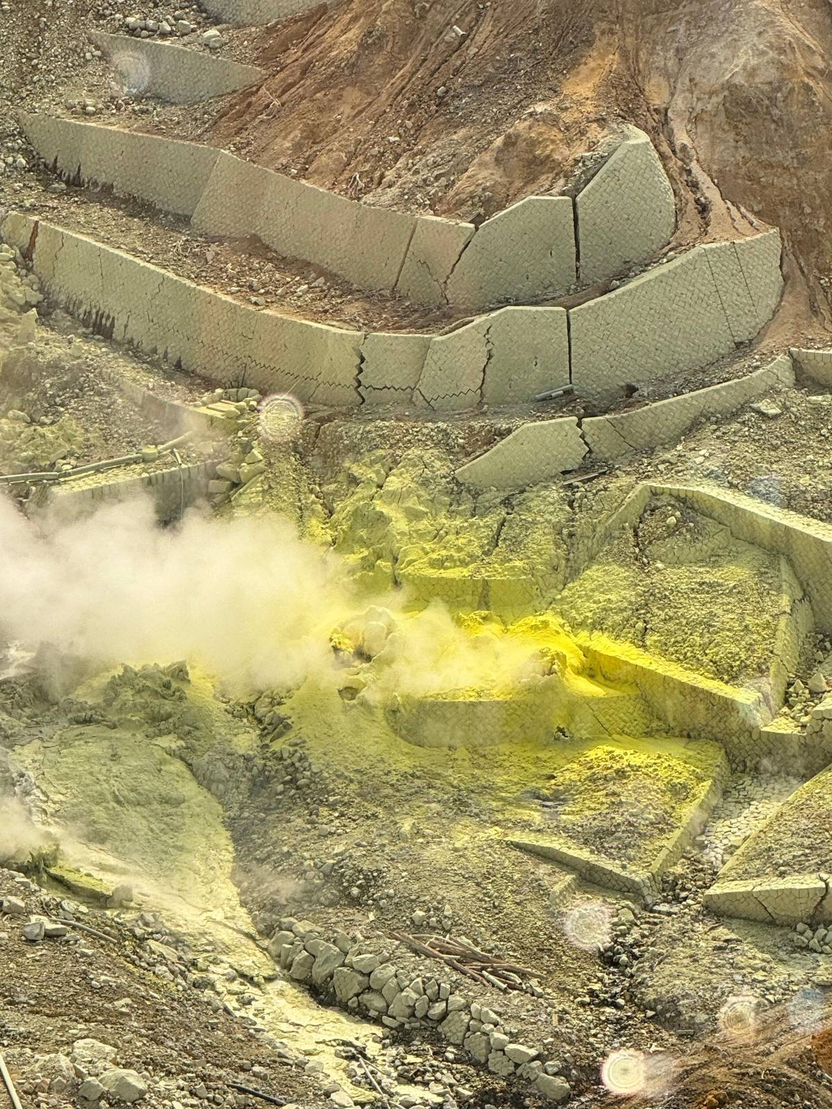 Yellow sulfur and steam at Owakudani