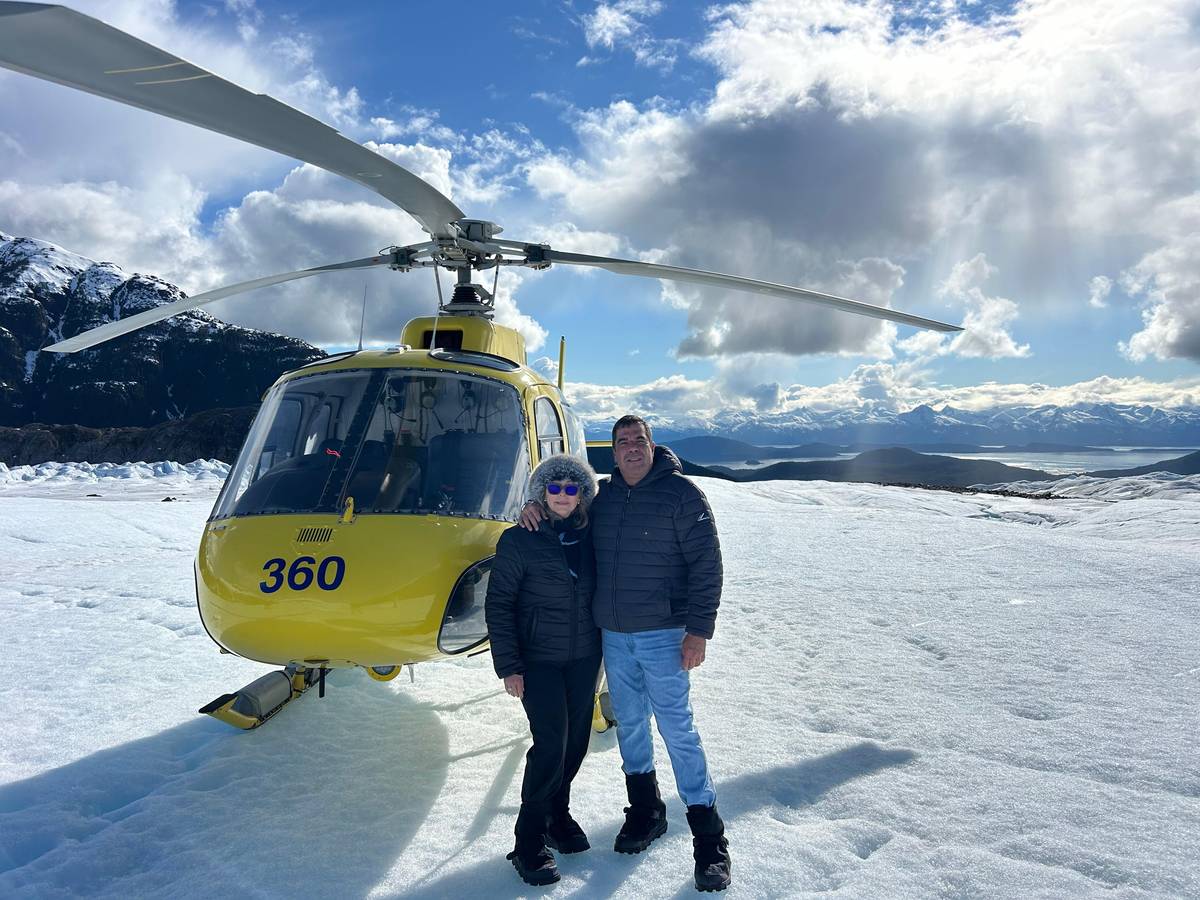A helicopter waits on Herbert Glacier