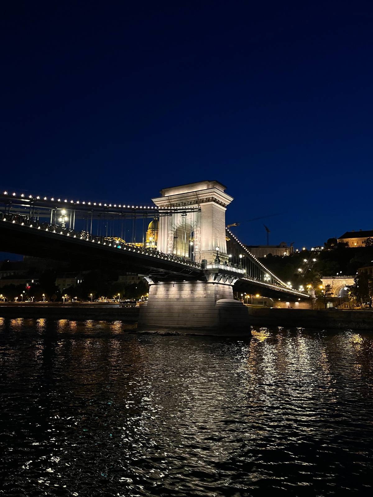 The Chain Bridge lit up after dark