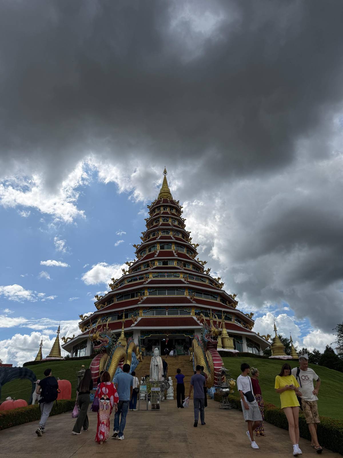 The red pagoda of Huay Pla Kang under storm clouds