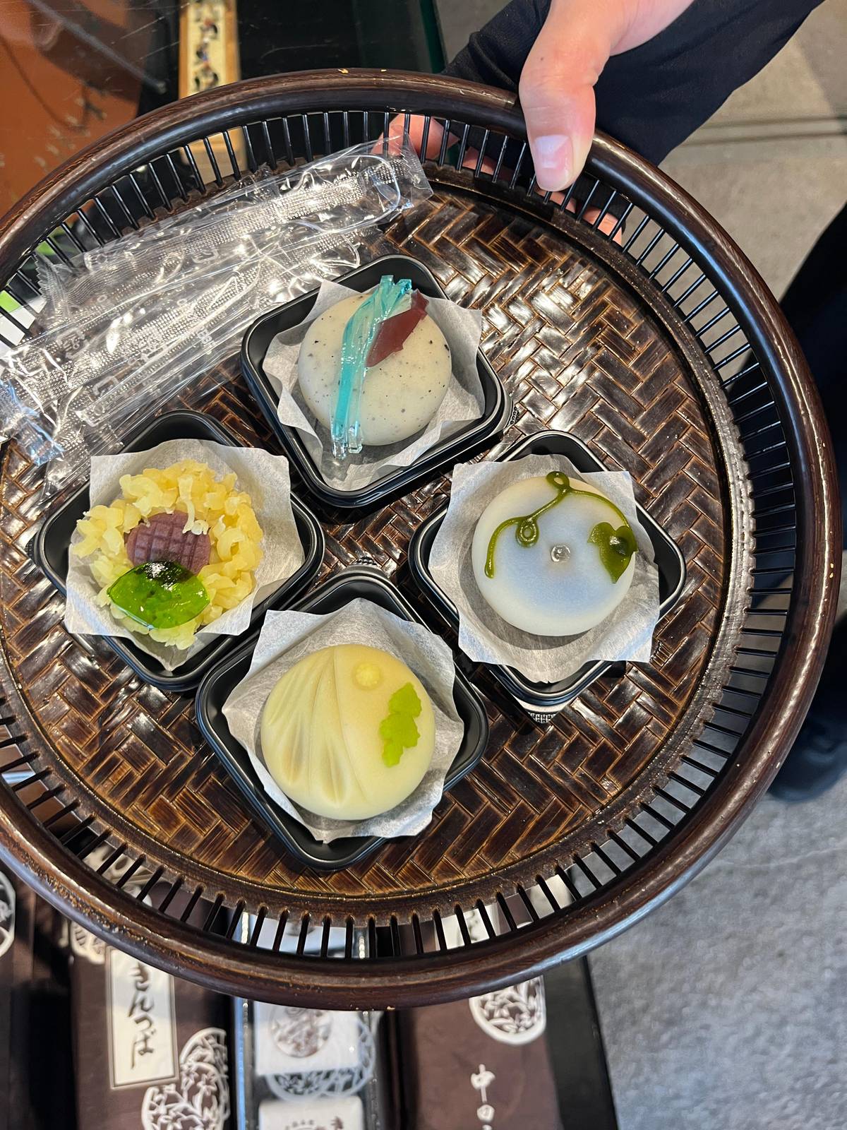 Japanese sweets on a woven tray