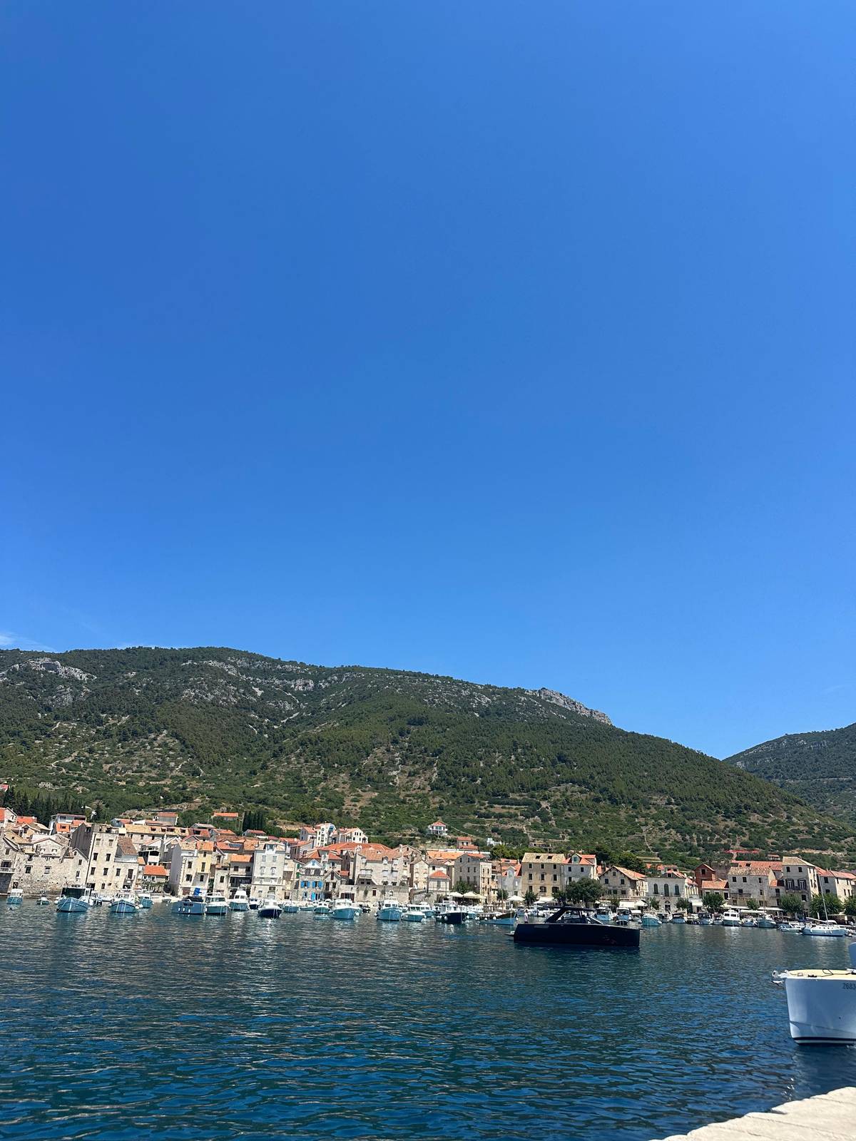 A harbour town under the hills of Vis