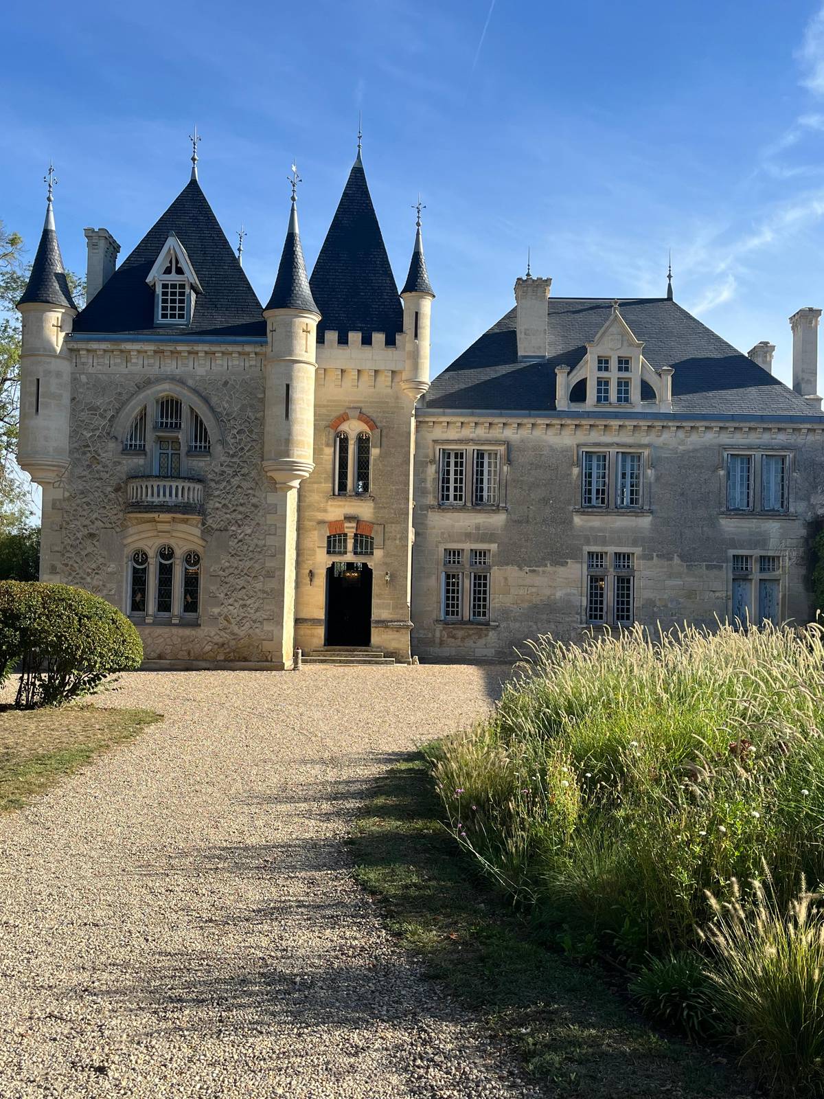 A château at the end of a gravel drive