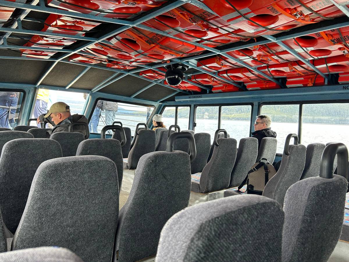 Seats inside the enclosed boat
