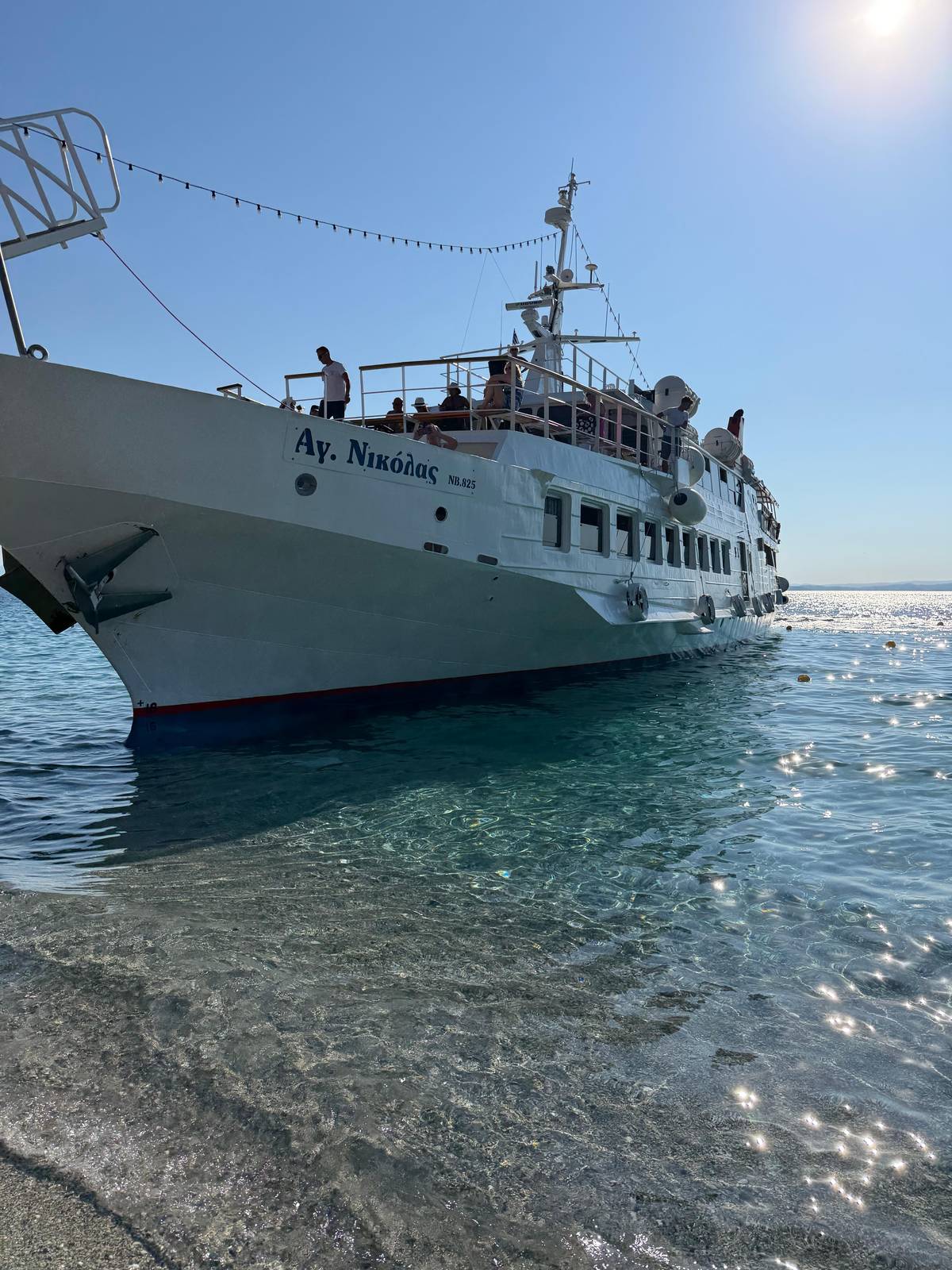 The Agios Nikolaos nosed up to a beach in clear water