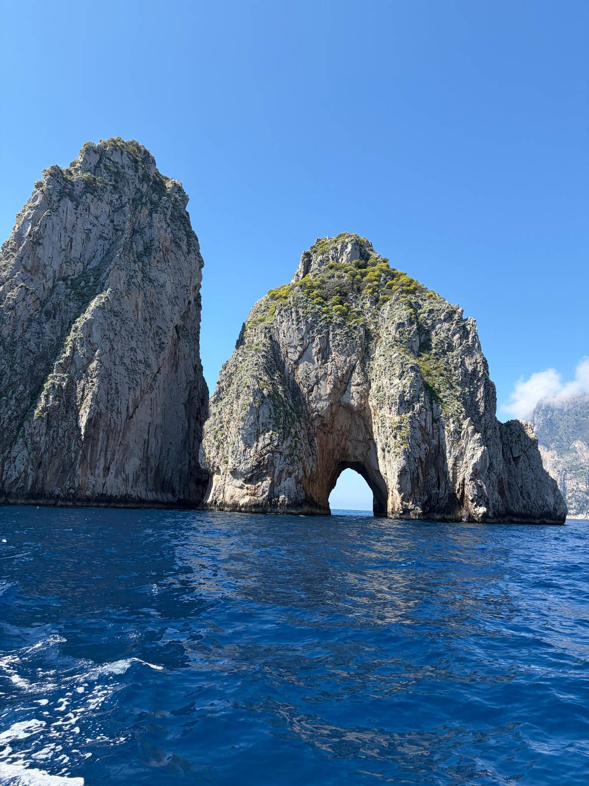 The Faraglioni seen from the sea