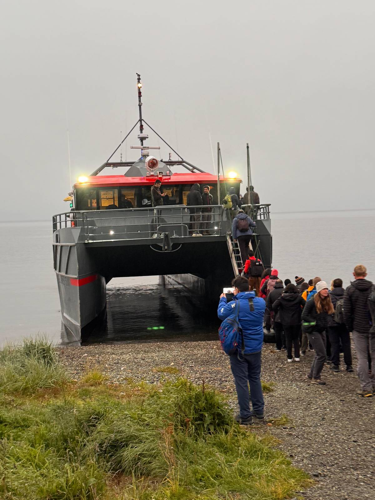 The boat nosed onto a gravel beach for boarding