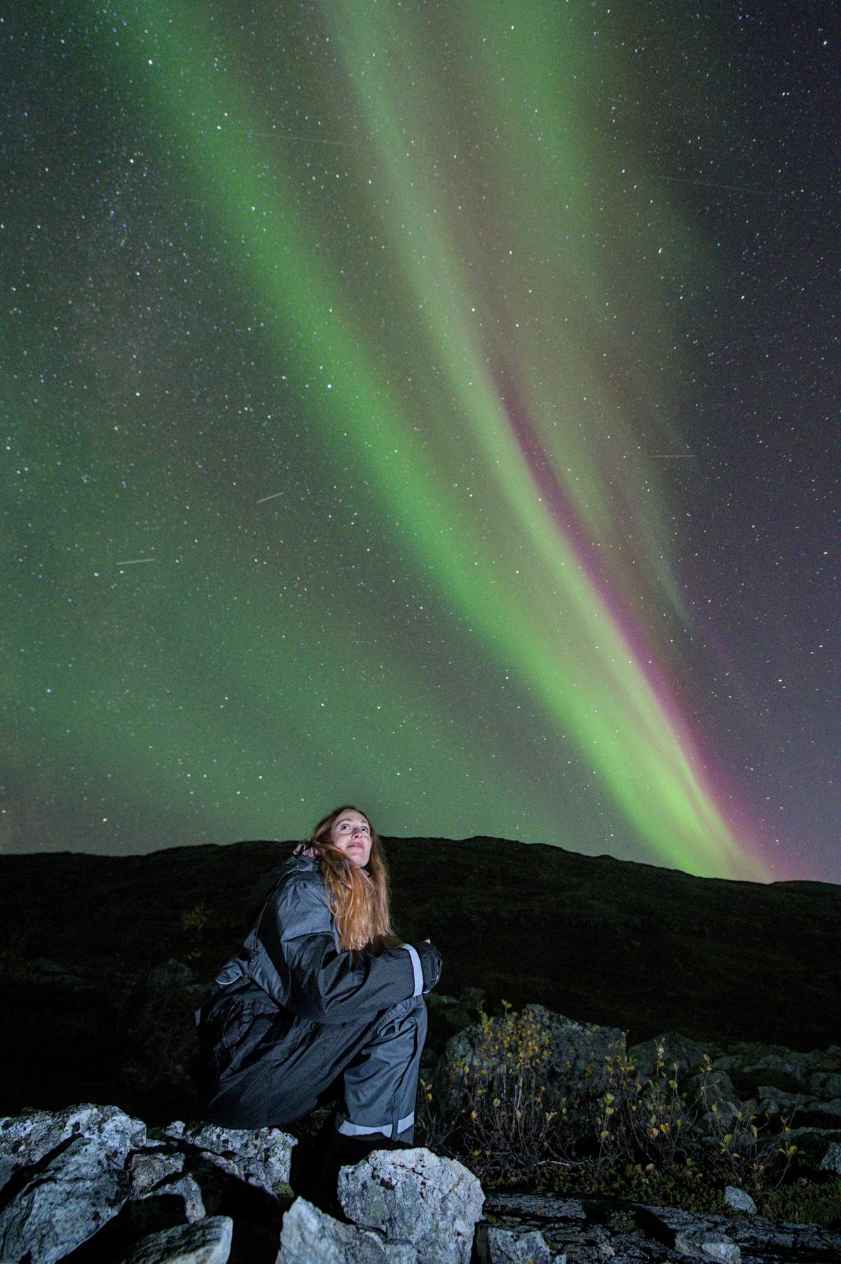 Tromsø: Northern Lights Hunt with a Professional Photographer in German