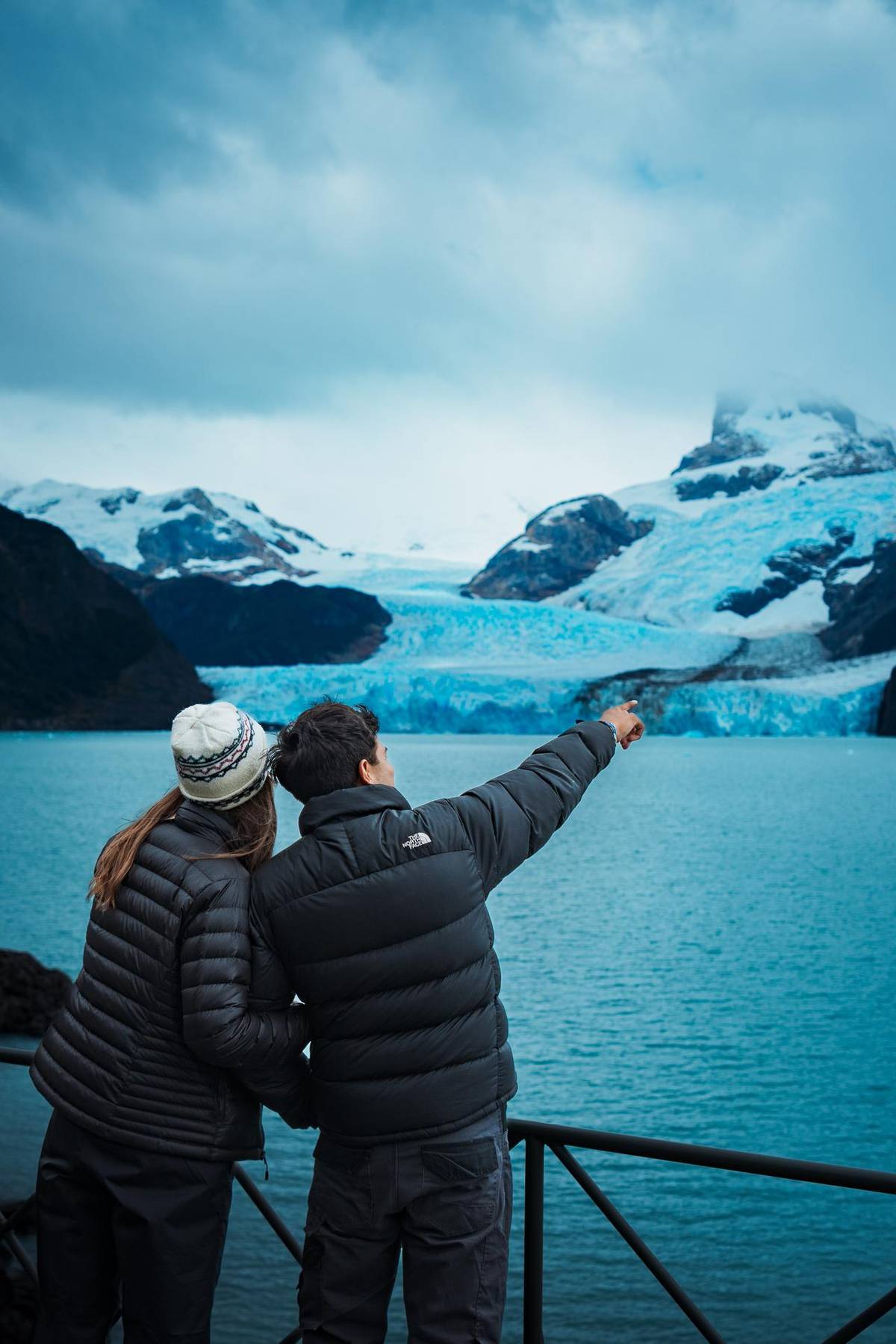 Pointing out the glacier from the deck