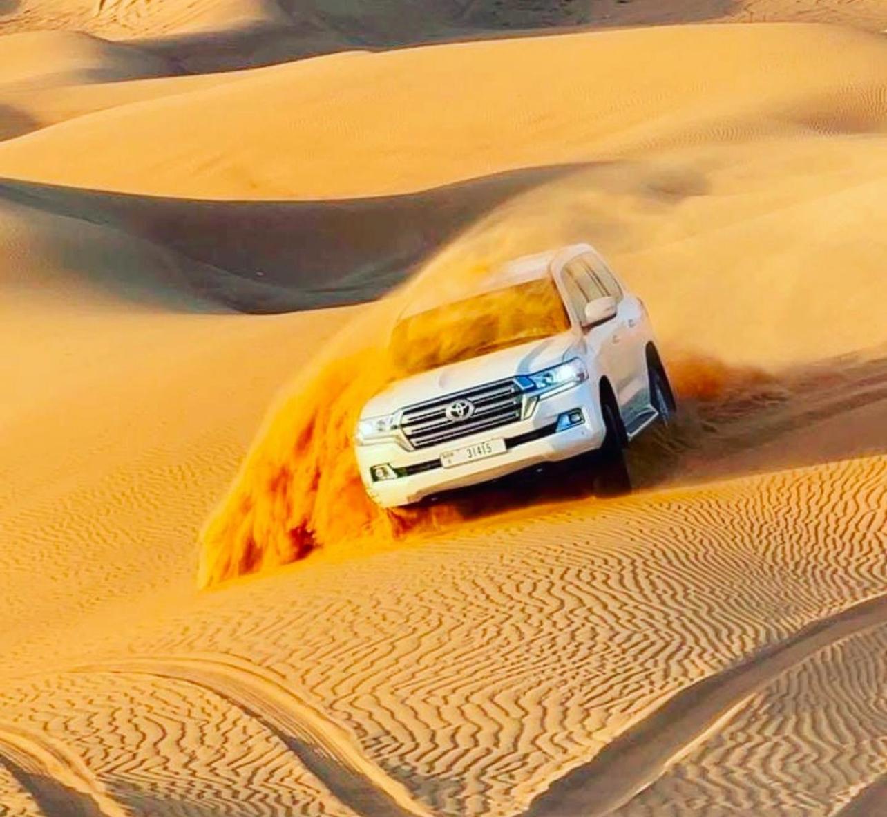 Doha: Sunset Desert Safari with Camel Ride & Sandboarding 2