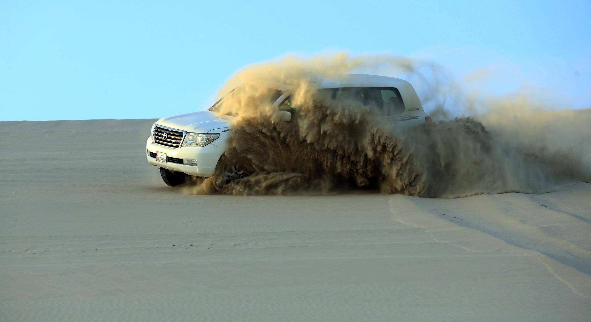 Doha: Private Desert Safari with Camel Ride & Sandboarding