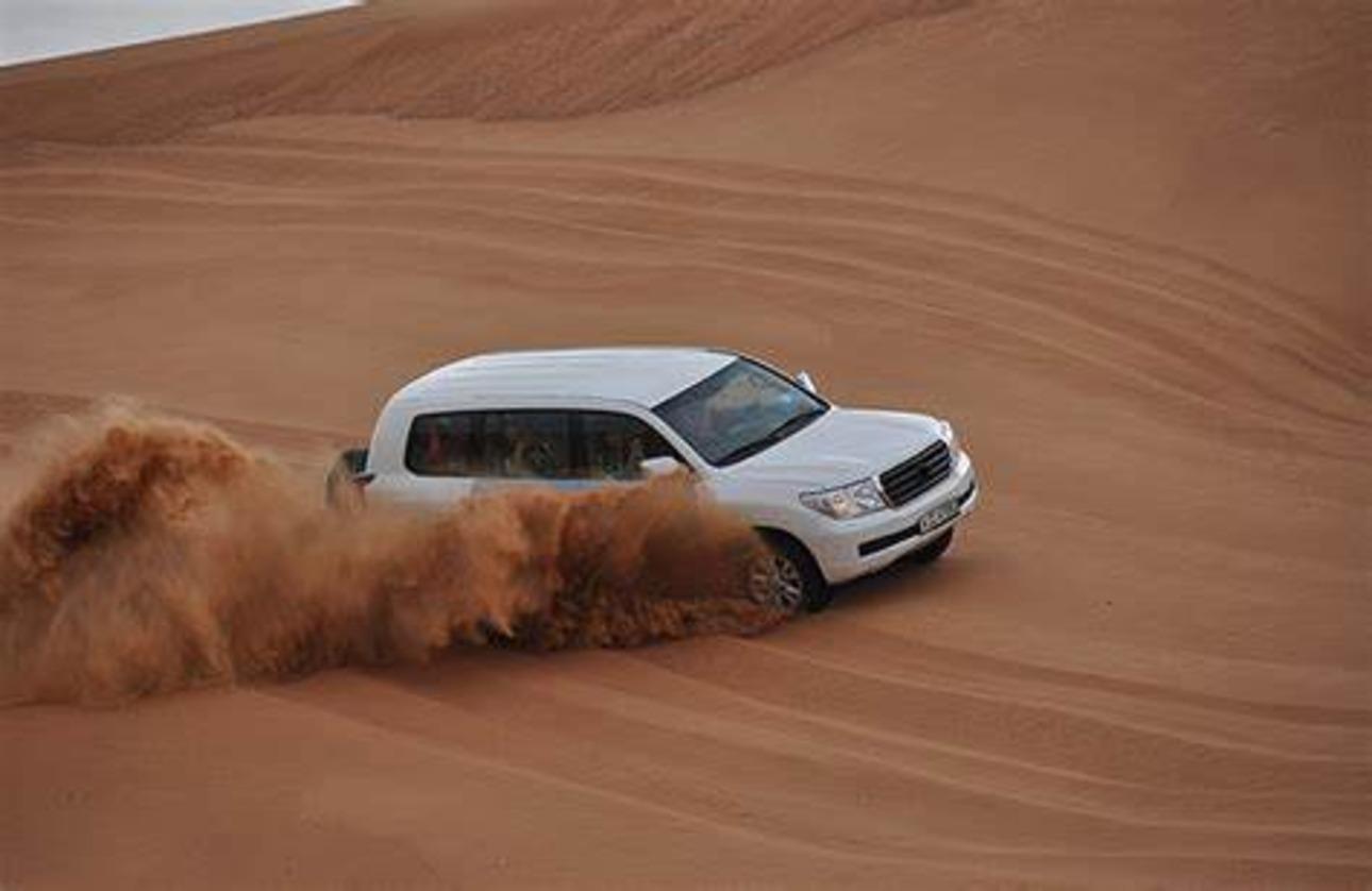 Doha Desert Safari: Sandboarding, Camel Ride & Swimming Fun 2