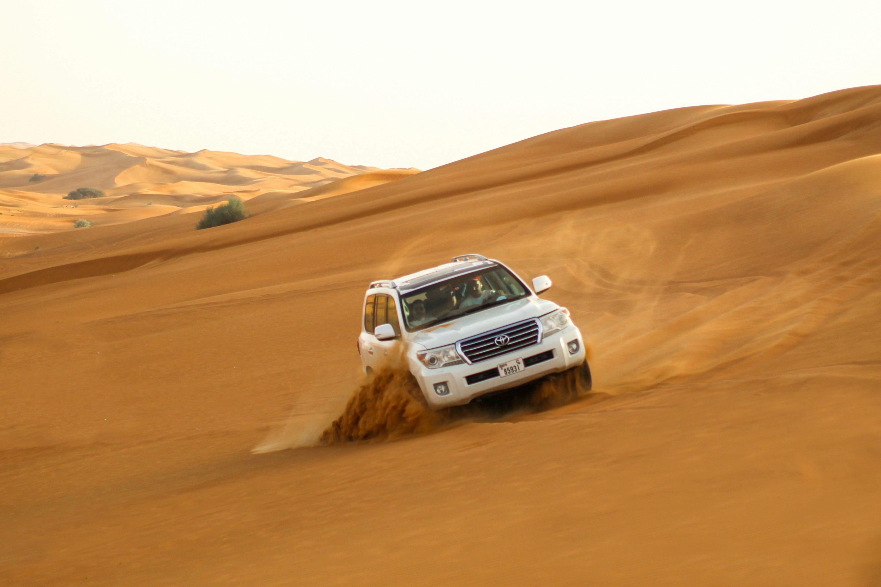 Doha: Sealine Desert Safari with Sandboarding & Camel Stop