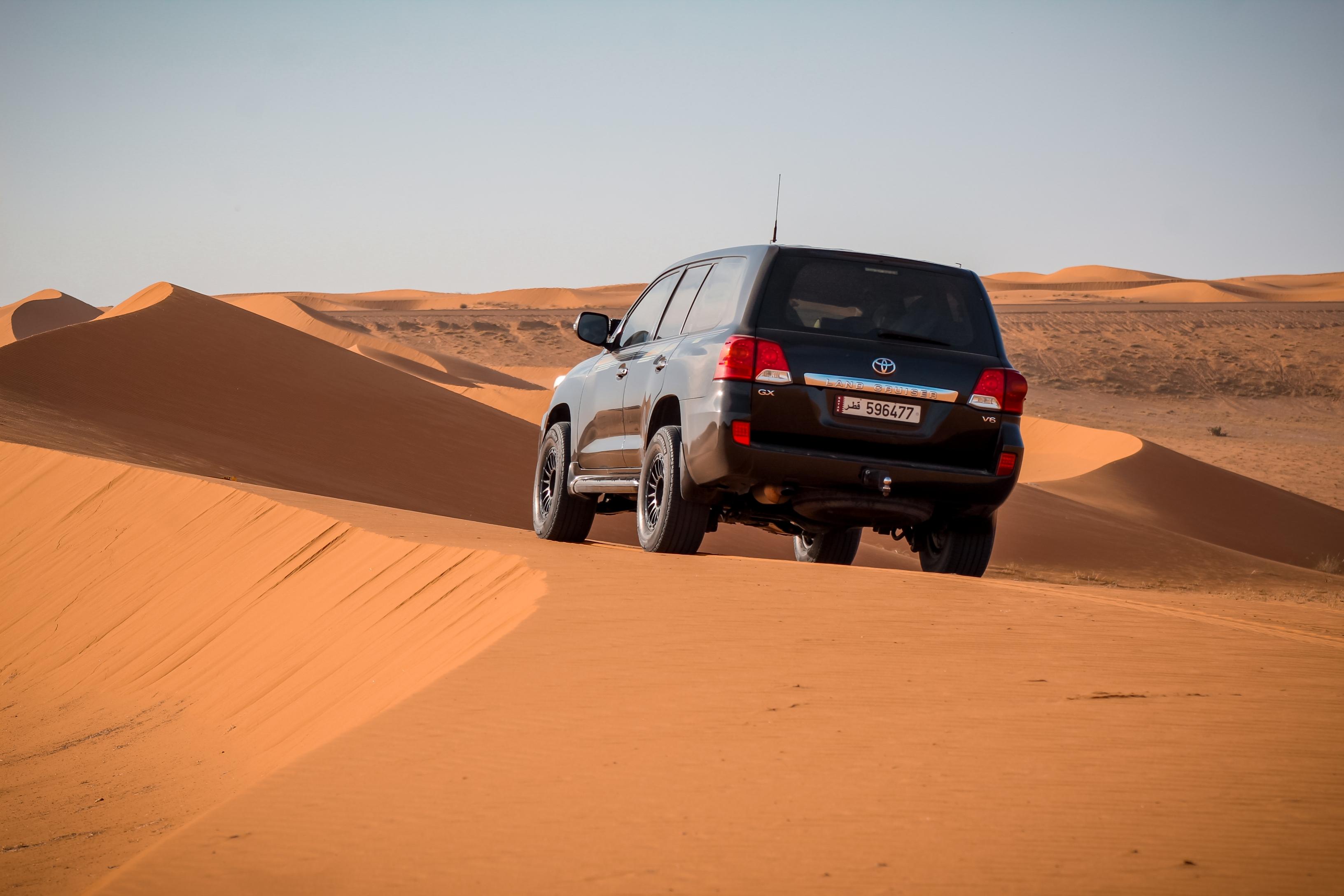 Qatar Desert Safari, Quad bike, Camel Ride and Sandboarding 2