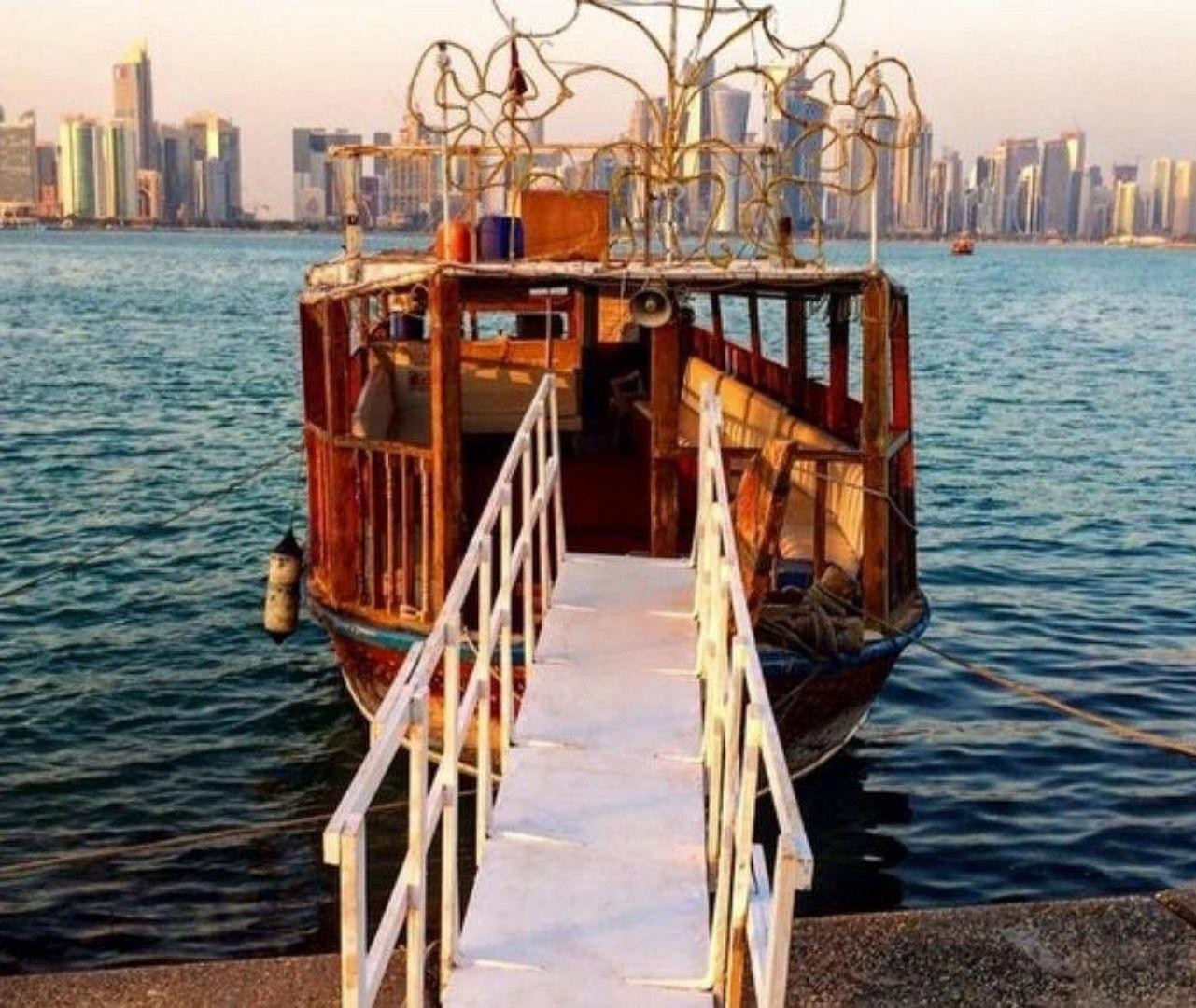 Twilight Over Doha: Guided Dhow Sailing with Tea &Star Views